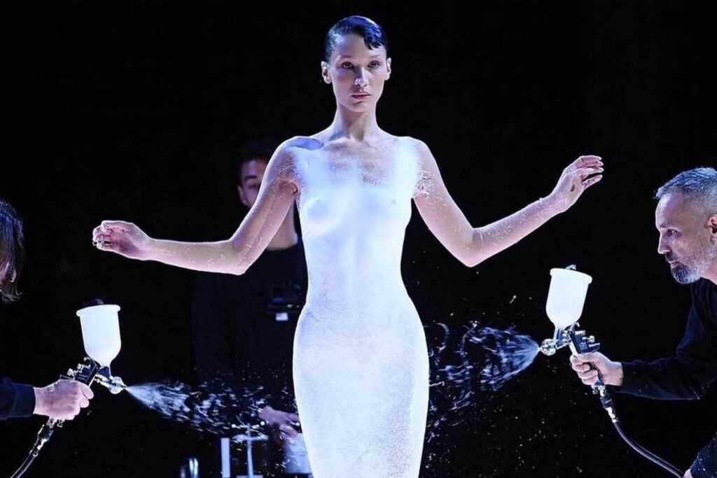 Bella Hadid Gets White Dress Spray-Painted on Her Mid-Show During Paris Fashion Week